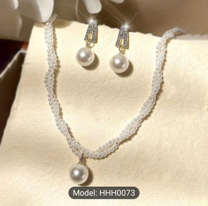 pearl strand nacklace with earing