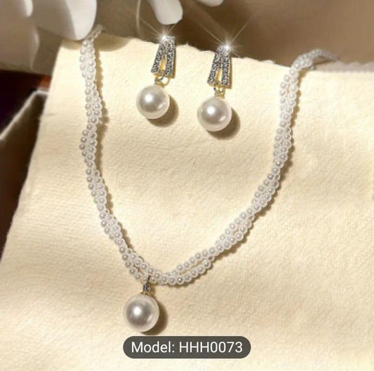 pearl strand nacklace with earing